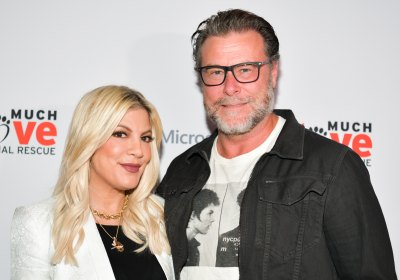 Tori Spelling and Dean McDermott pose for photos at the Much Love Animal Rescue 3rd Annual Spoken Woof Benefit