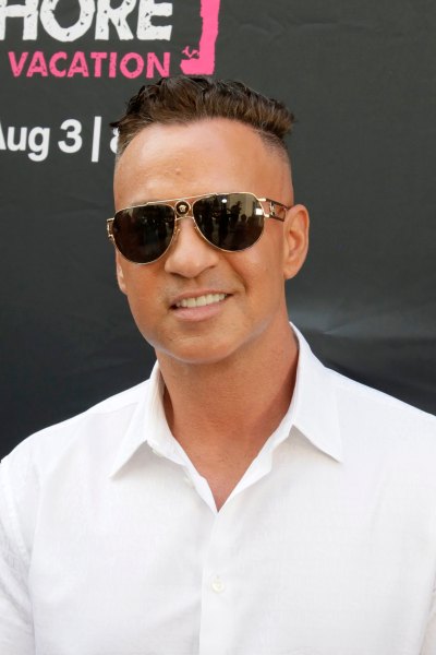 Jersey Shore star Mike Sorrentino wearing a white button down and sunglasses