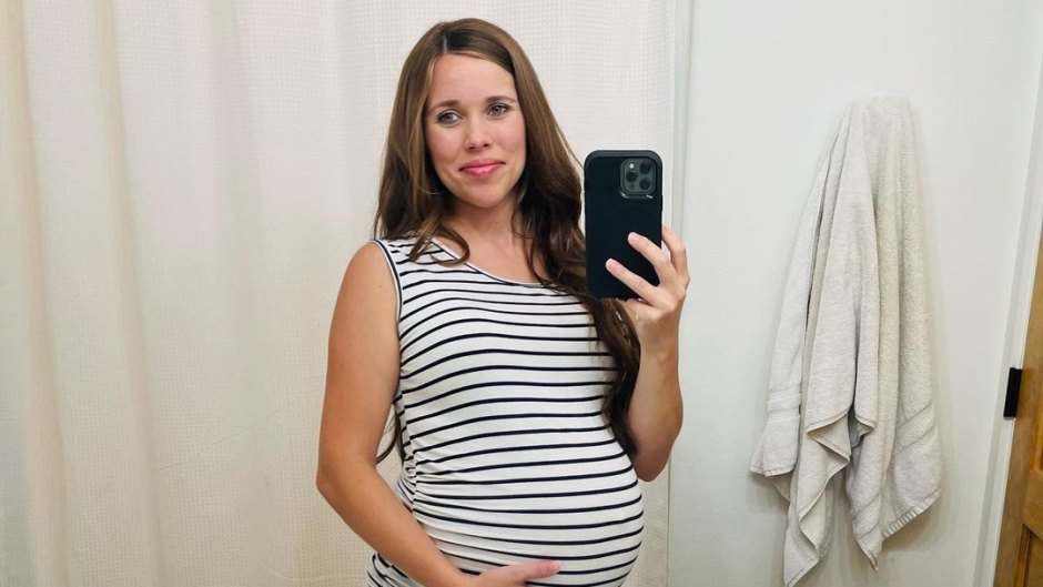 Jessa Duggar shows off her baby bump in a black and white striped shirt