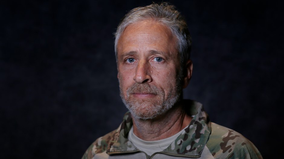 Jon Stewart wears a camo and beige quarter zip at the 2019 Warrior Games.