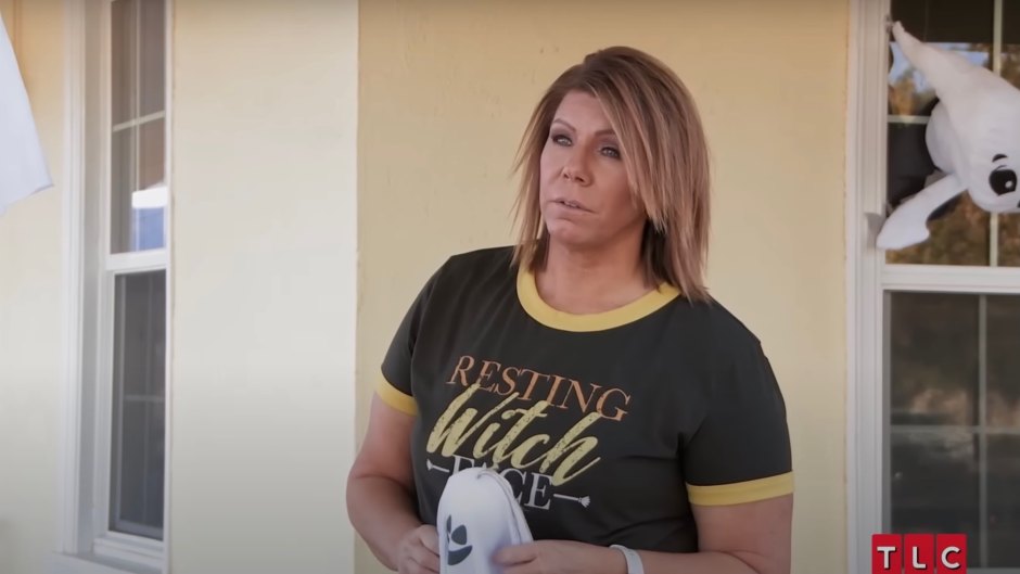 Meri Brown wears a black and yellow tshirt during a scene from Sister Wives