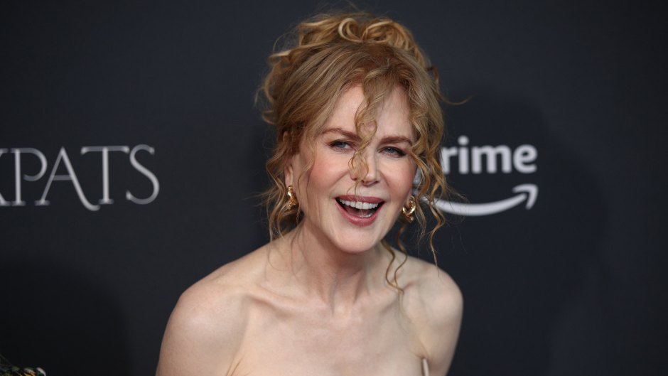 Nicole Kidman wears a gold dress at the 'Expats' premiere.