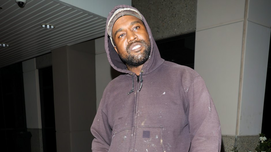 Kanye West seen in Los Angeles wearing a zip up hoodie