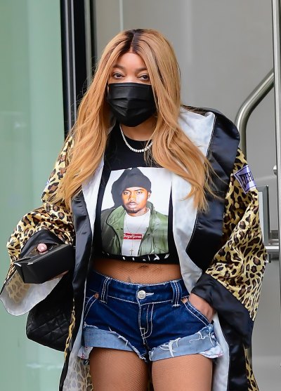 Wendy Williams wears a leopard print jacket with a tshirt and denim shorts
