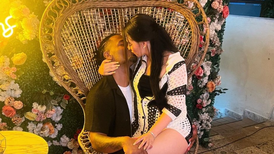 Teen Mom's Kayla Sesser and boyfriend Ryan Leigh kiss while sitting in a chair